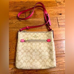 Coach cross body purse tan and pink